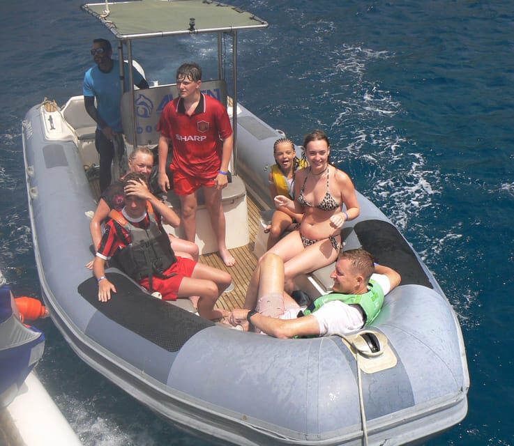 From Puerto Rico: Boat trip along the coast w/ Food & Drinks - Sailing the south coast: cliffs, marine life, and glass-bottom viewing