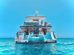 From Puerto Rico: Boat trip along the coast w/ Food & Drinks - Mogán stretch and banana boat time