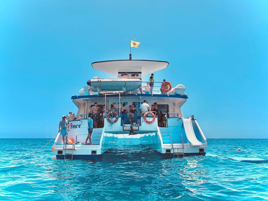 From Puerto Rico: Boat trip along the coast w/ Food & Drinks - Mogán stretch and banana boat time
