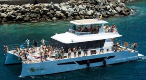 Gran Canaria: Afternoon Catamaran Cruise with Food & Drink - Cruising the Gran Canaria southwest coast: Mogan cliffs and coves