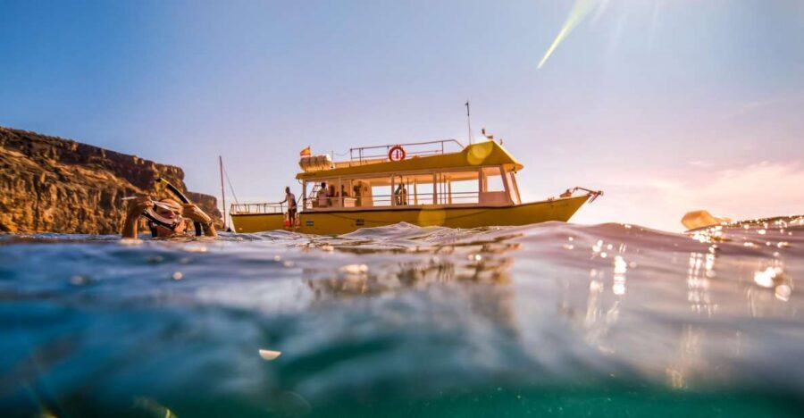 Puerto de Mogan: Boat and Snorkeling Trip - Tasarte coast cruising: where you get your photo time